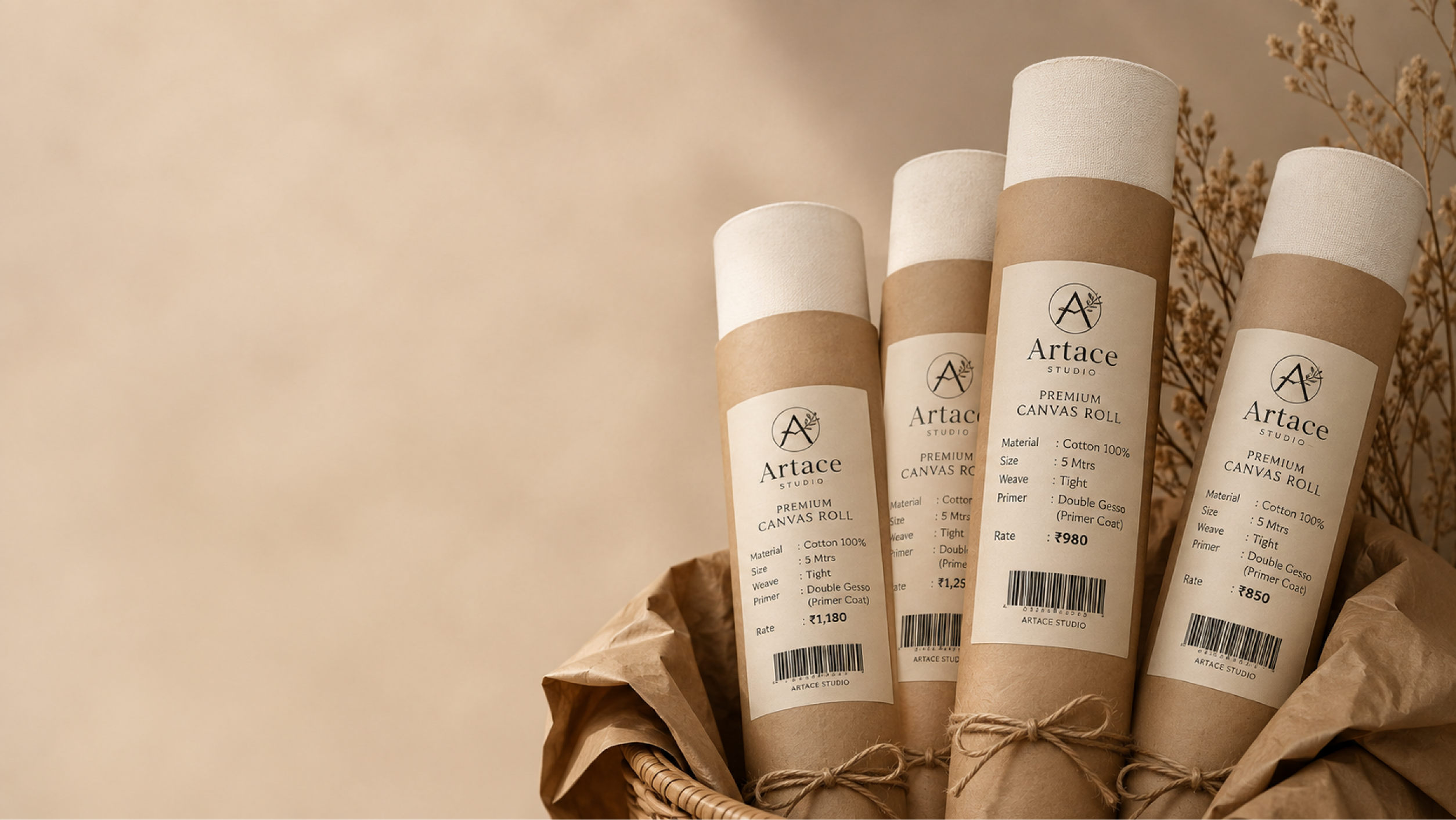 Rolled Artace Studio premium canvas rolls, labeled and tied with twine, arranged in a basket with dried flowers